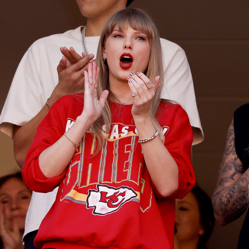 Taylor Swift cheering on her boyfriend Travis Kelce and the Kansas City Chiefs.