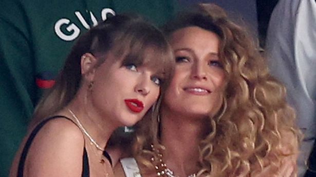 Taylor Swift and Blake Lively sharing a hug in February