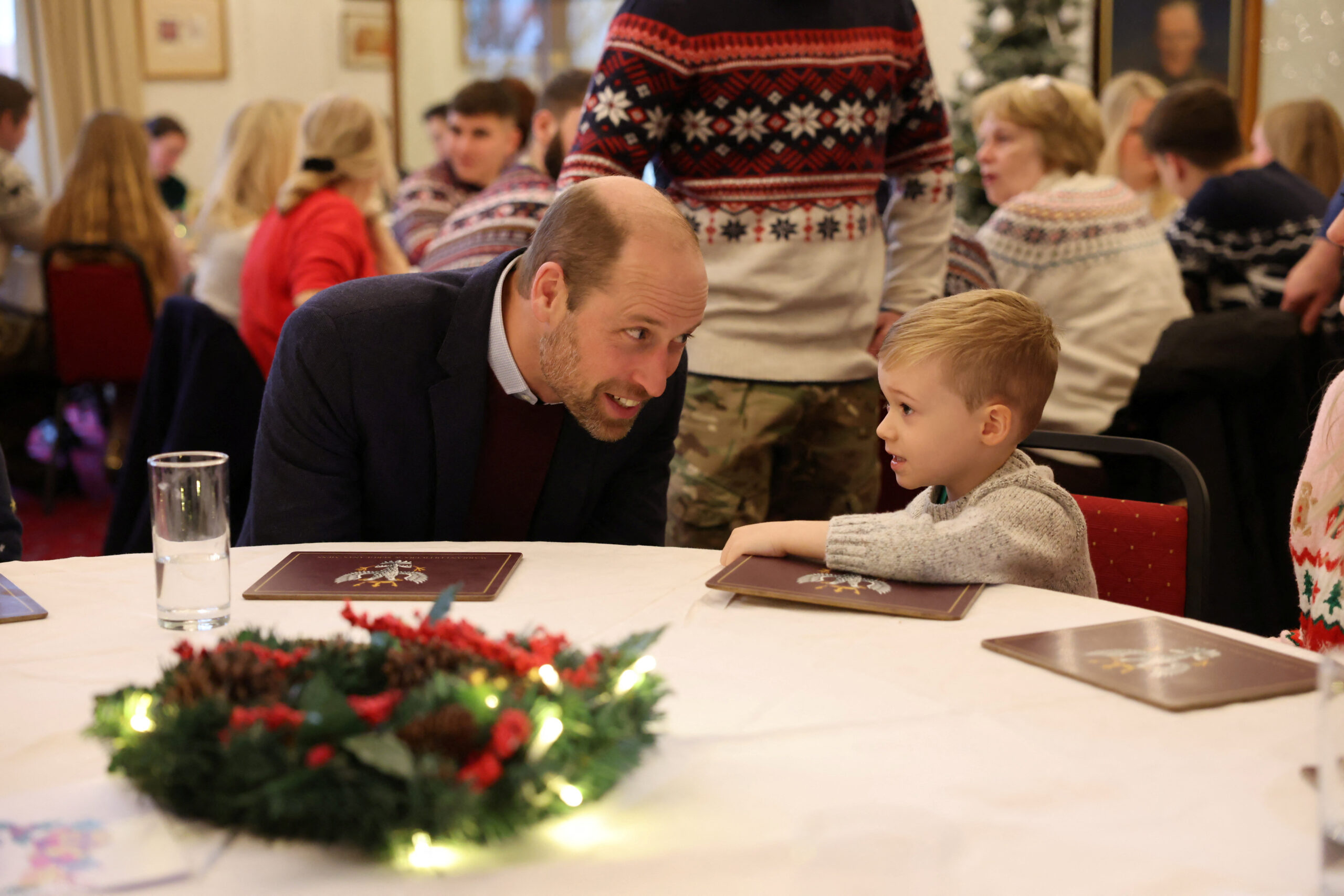 During a trip to Wiltshire, England, Prince William  visits the 1st Battalion Mercian Regiment and chats with his young fans.