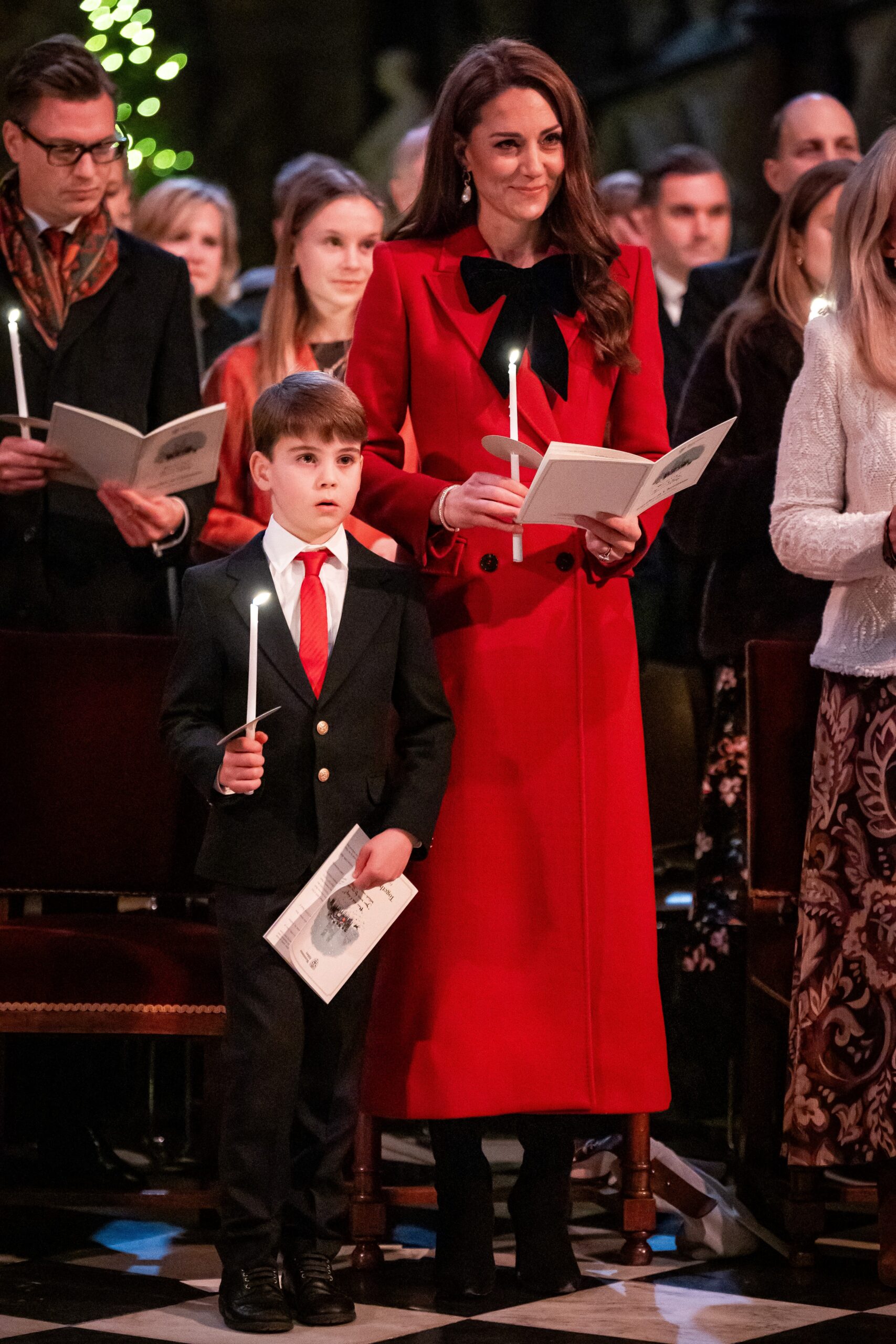 Prince Louis of Wales (L) and Britain's Catherine, Princess of Wales attend the "Together At Christmas" Carol Service."