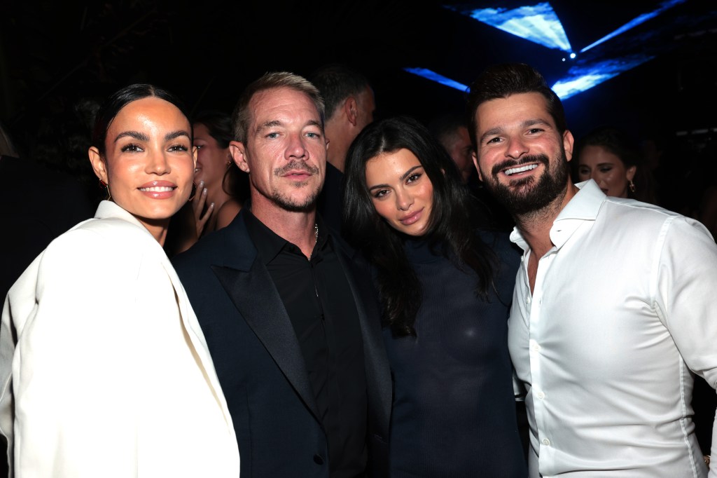 Diplo and Sinan Tuna with models at Sinan Tuna's 2024 Art Basel Party in Miami on Dec. 5.