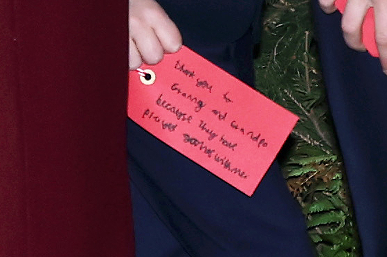 Prince Louis's note at the "Together at Christmas" carol service in December 2024