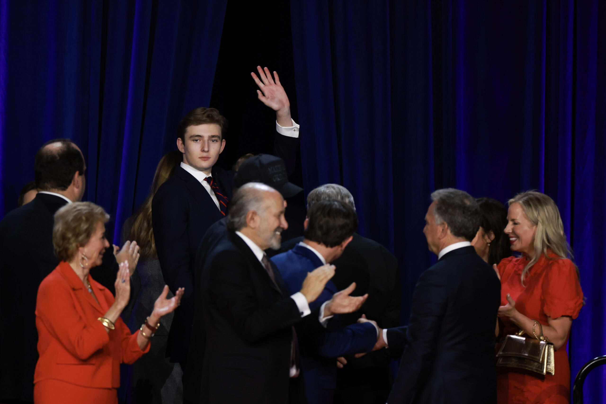 Barron Trump waving while leaving an election night watch party in 2024.