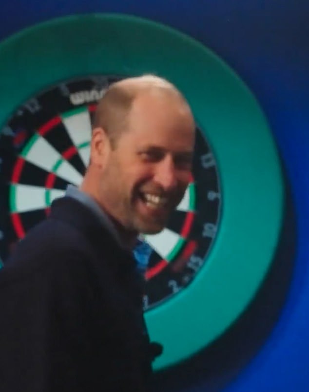 Dressed in plastic-free trainers by the British brand HEVEA and a casual blue jumper, William appeared relaxed as he played darts with Hannah