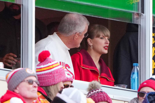 Nov 29, 2024; Kansas City, Missouri, USA; Pop star Taylor Swift watches the game with her father Scott against the Las Vegas Raiders during the first half at GEHA Field at Arrowhead Stadium. Mandatory Credit: Denny Medley-Imagn Images