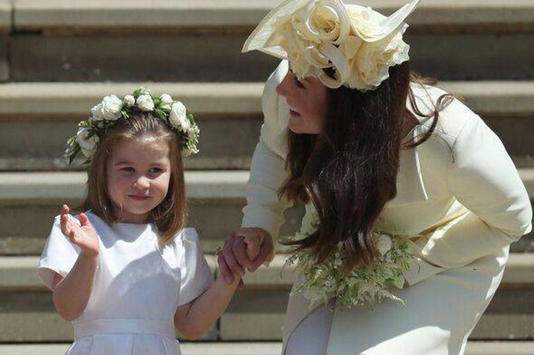 Princess Charlotte with Princess Kate on Harry and Meghan's wedding day