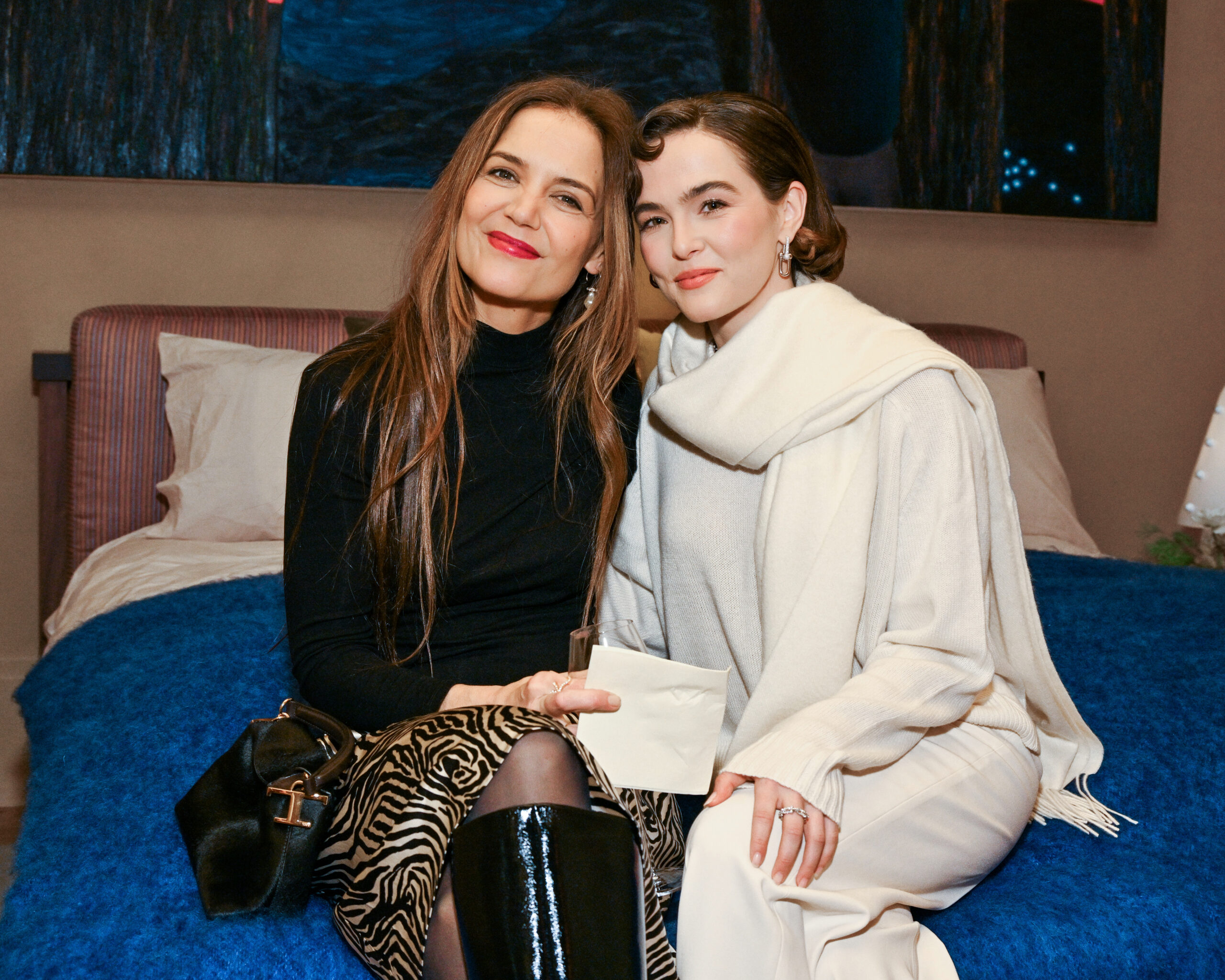 “Our Town” co-stars Katie Holmes (left) and Zoey Deutch  trade the stage for a holiday party in Tribeca.