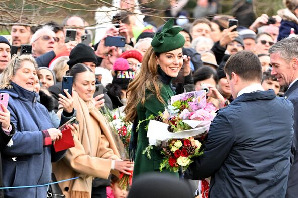 Princess Kate was handed plenty of flowers 