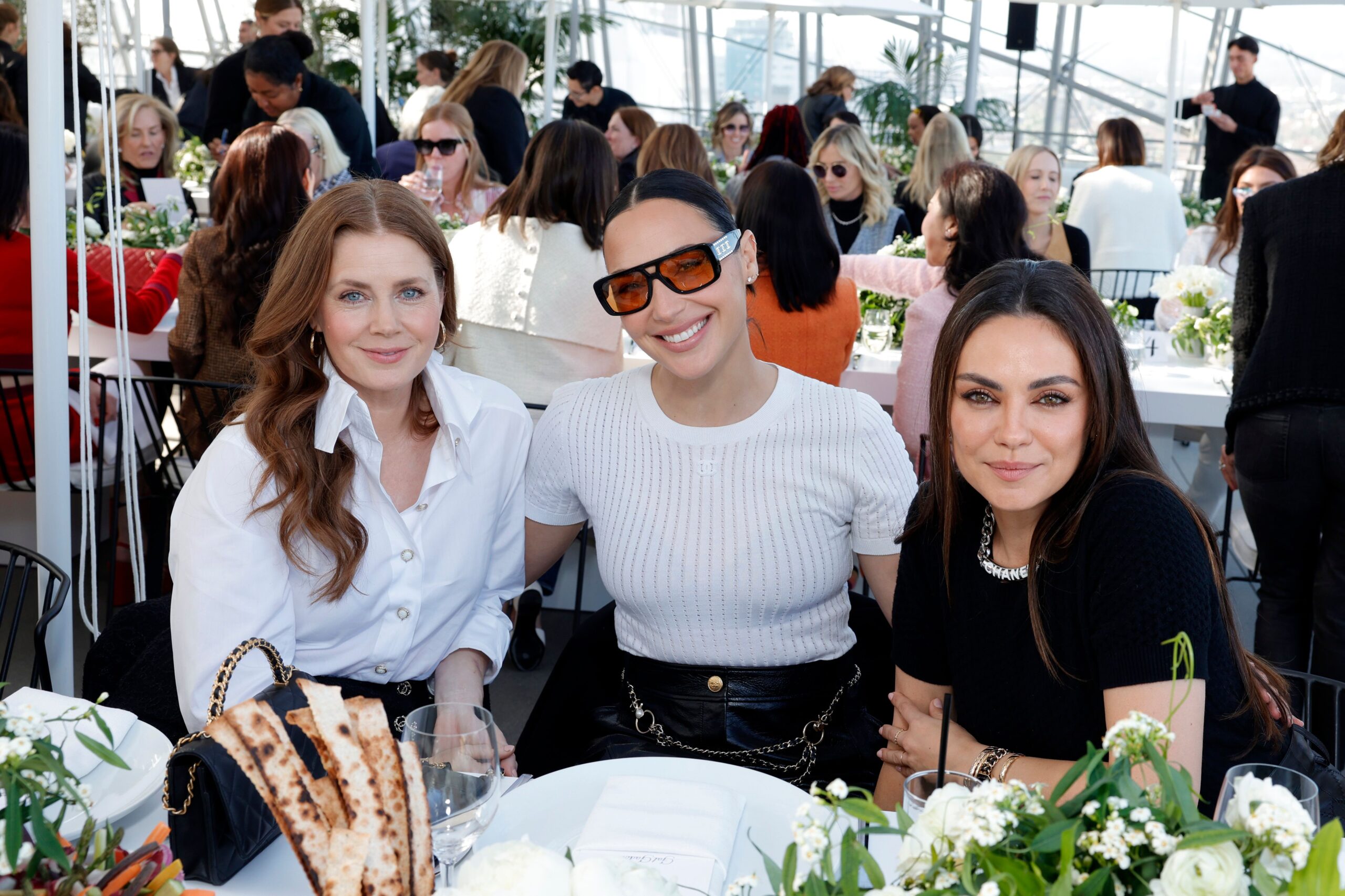 Amy Adams (from left), Gal Gadot and Mila Kunis enjoy each other’s company at the Academy Women’s Luncheon in LA.