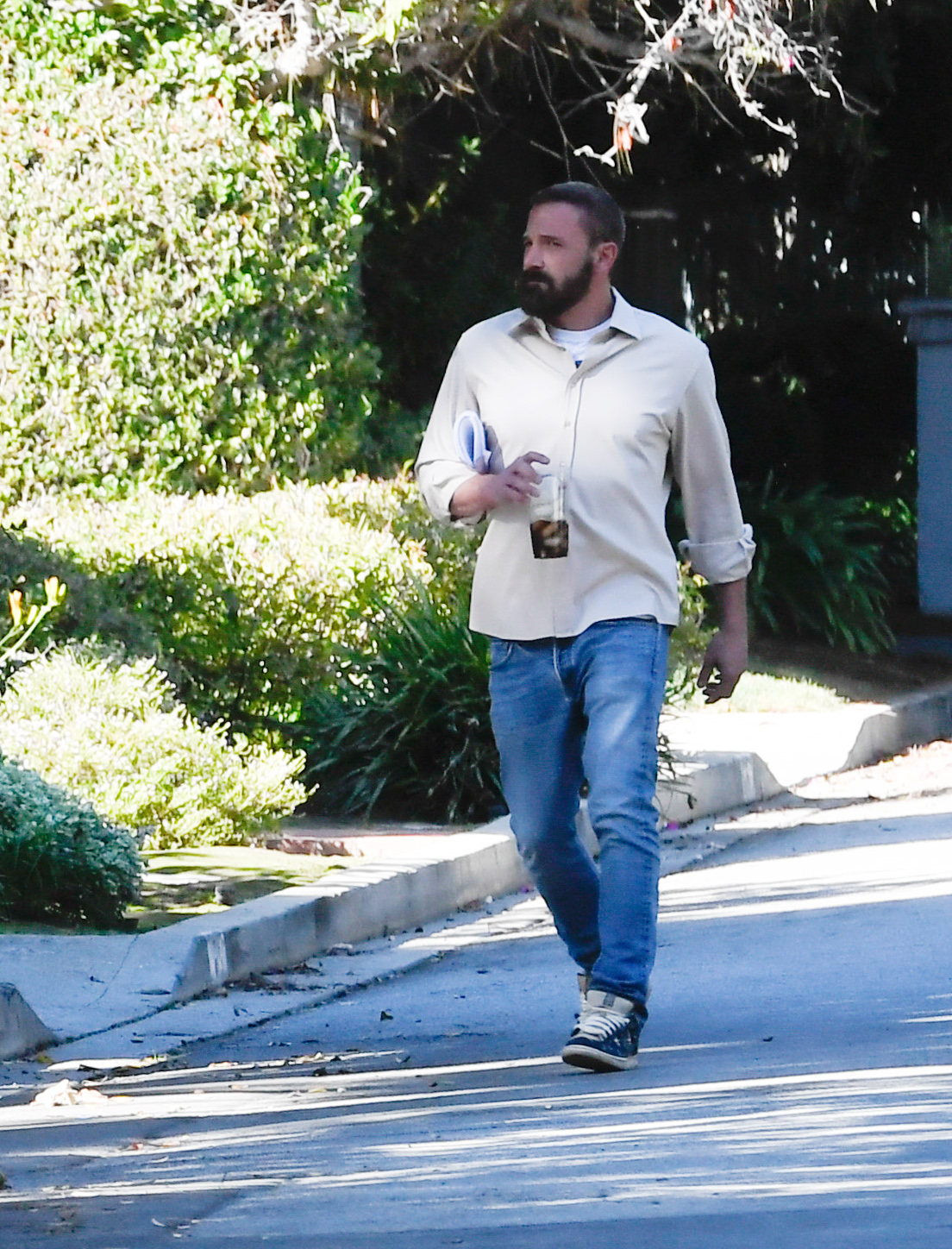 Ben Affleck walking to Jennifer Garner's house in Brentwood, Calif., on Thanksgiving in November 2024