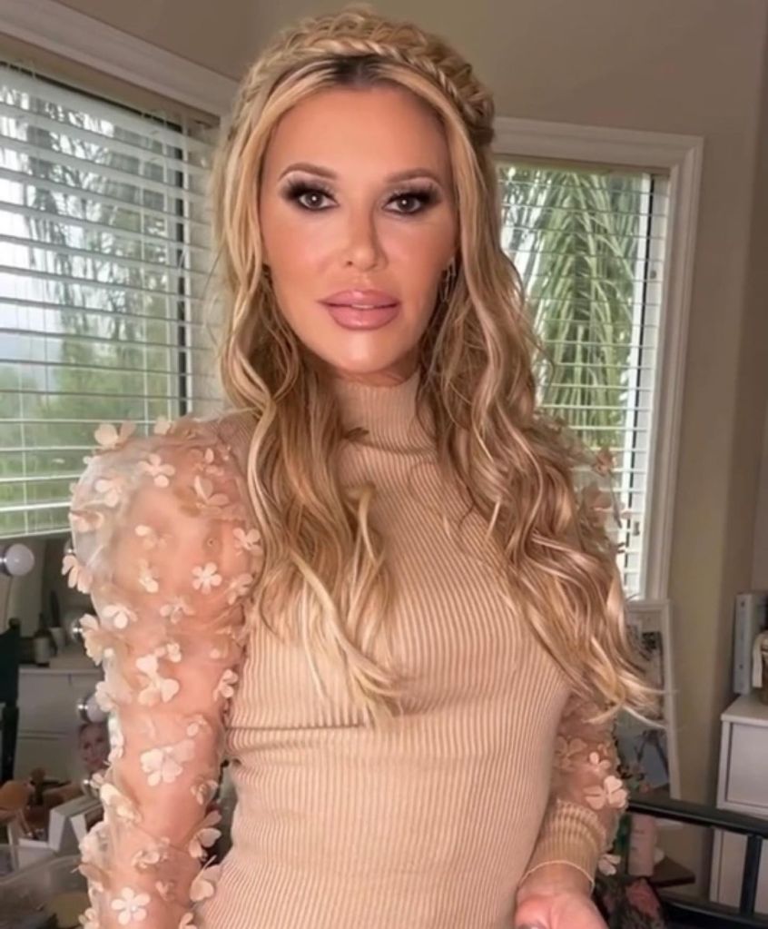 Brandi Glanville poses glammed up.