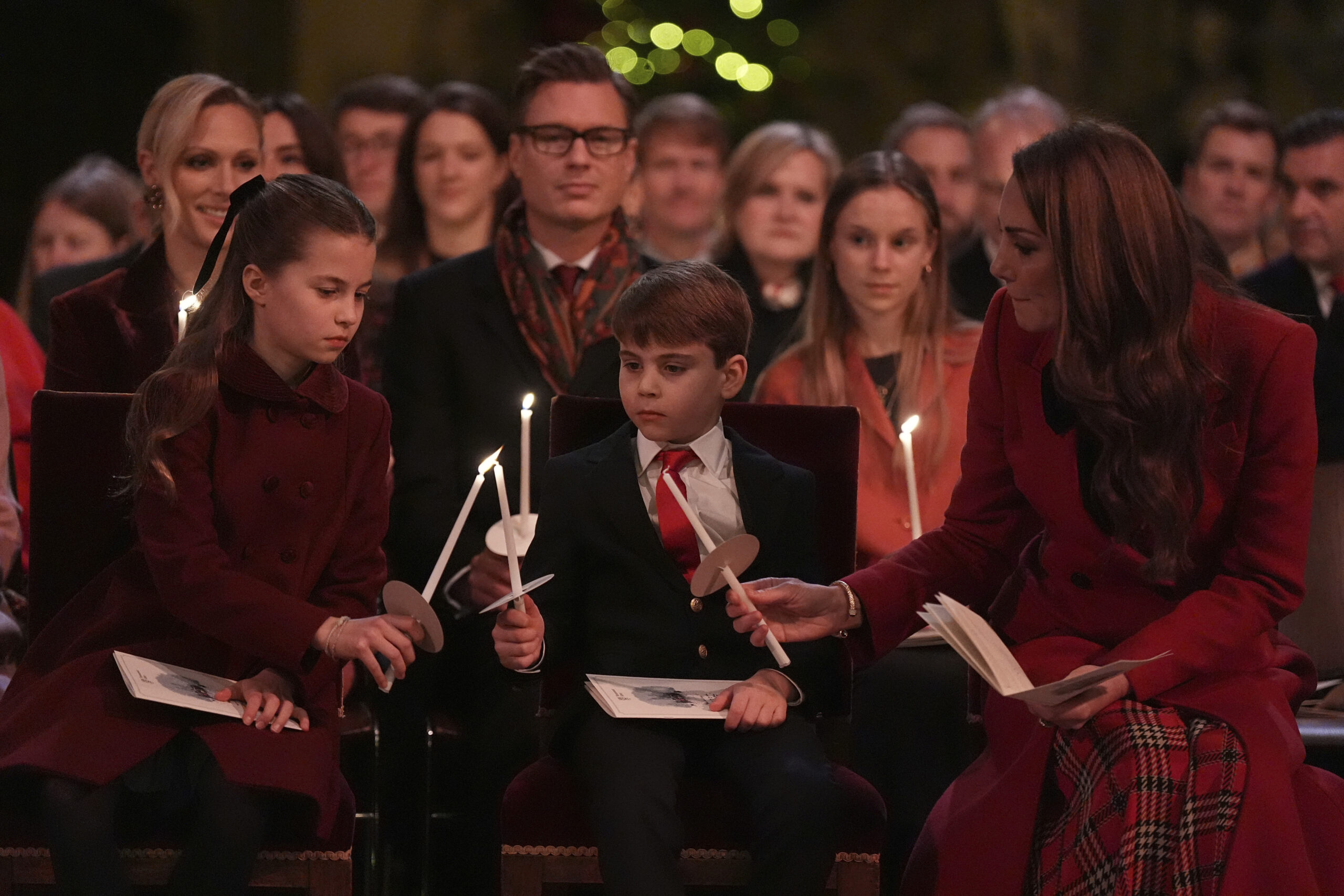 Princess Charlotte, Prince Louis and Kate Middleton at the "Together at Christmas" carol service in December 2024