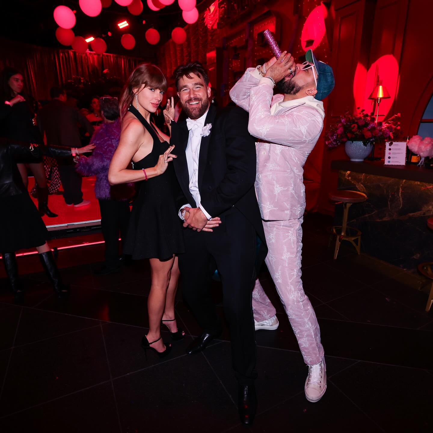 Travis Kelce, Taylor Swift and Ross Travis at the Eras Tour wrap party.