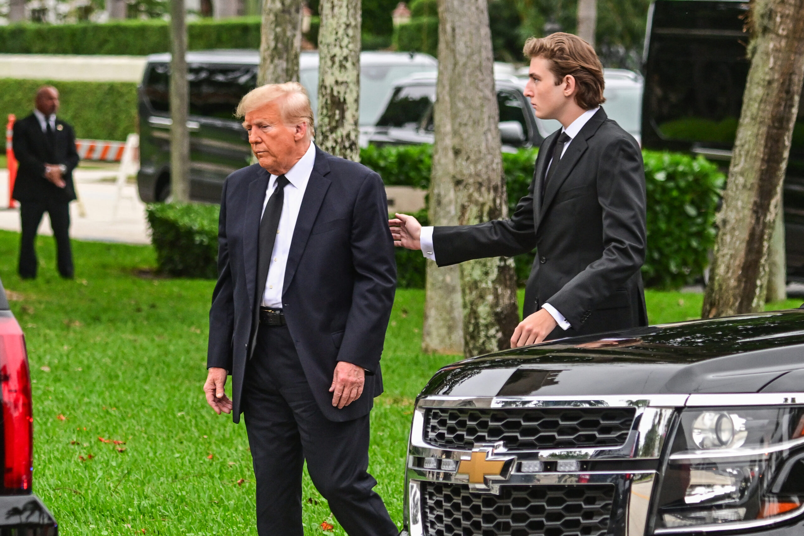 Donald Trump and Barron Trump at the the funeral of Melania Trump's mother, Amalija Knavs.