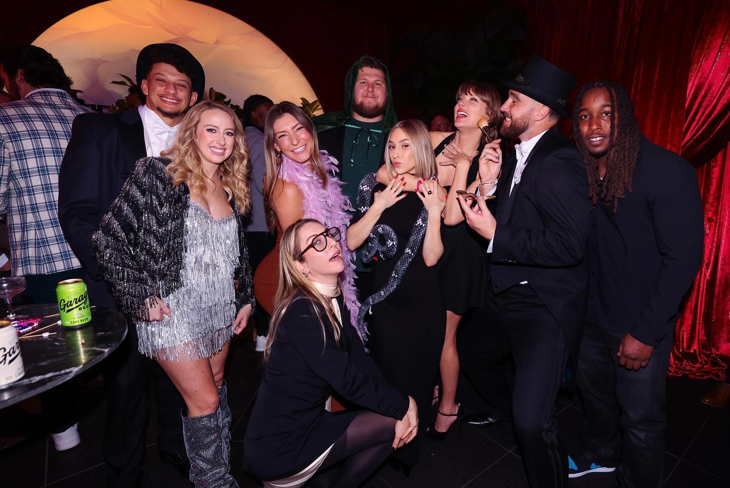 Taylor Swift partying with her friends, including Brittany Mahomes and Patrick Mahomes.