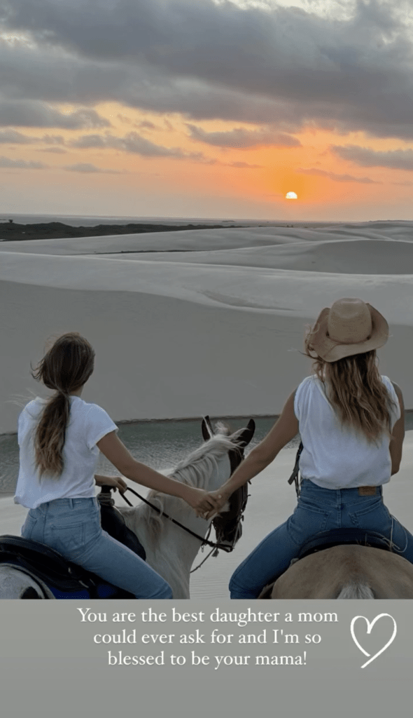 Gisele Bundchen and are daughterare seen holding hands while horseback riding.