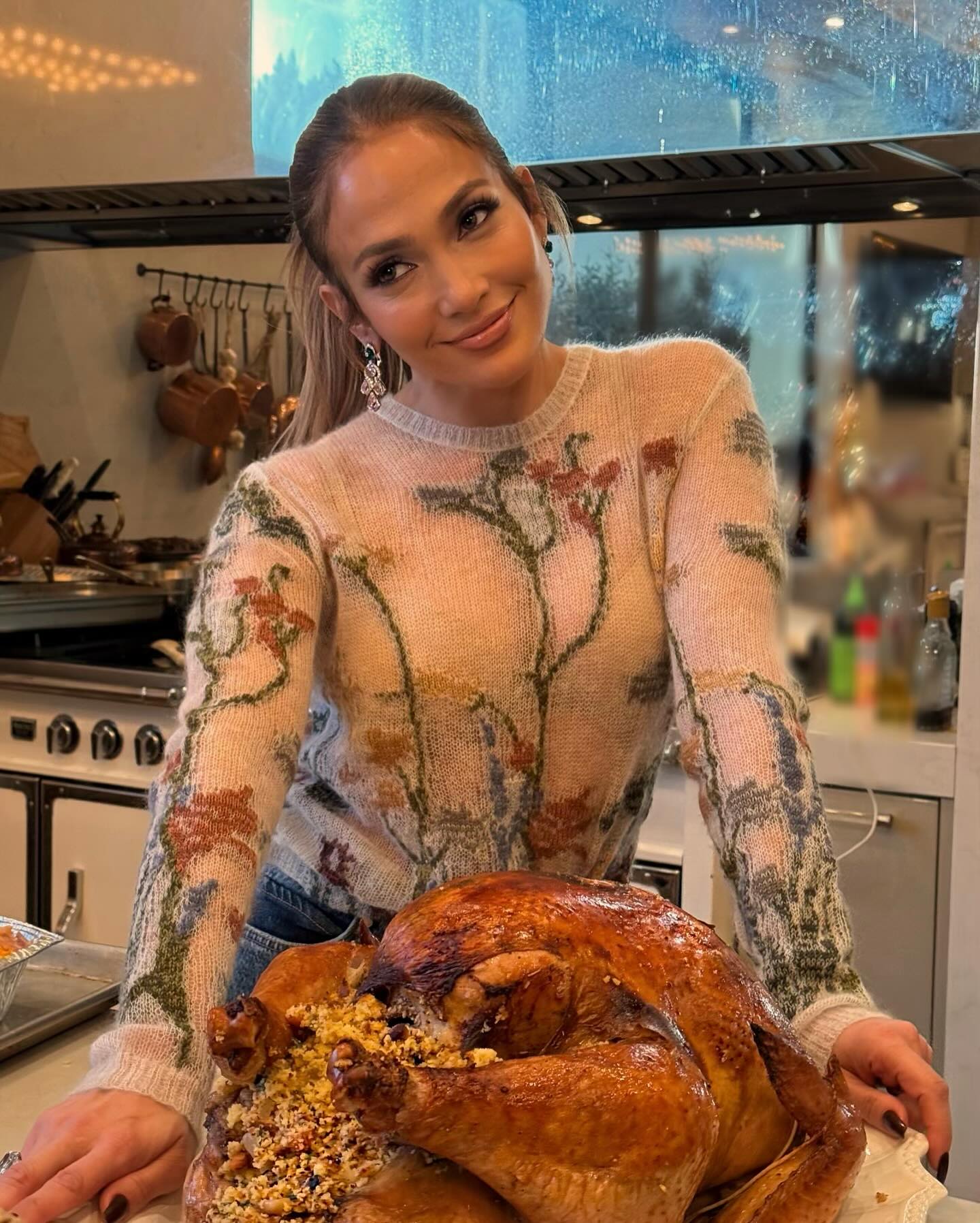 Jennifer Lopez posing with a turkey on Thanksgiving in November 2024