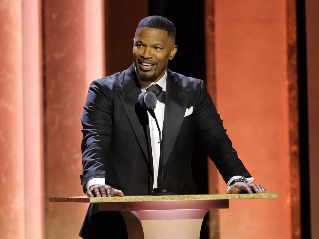 Jamie Foxx speaking onstage during the 2024 Governors Awards.