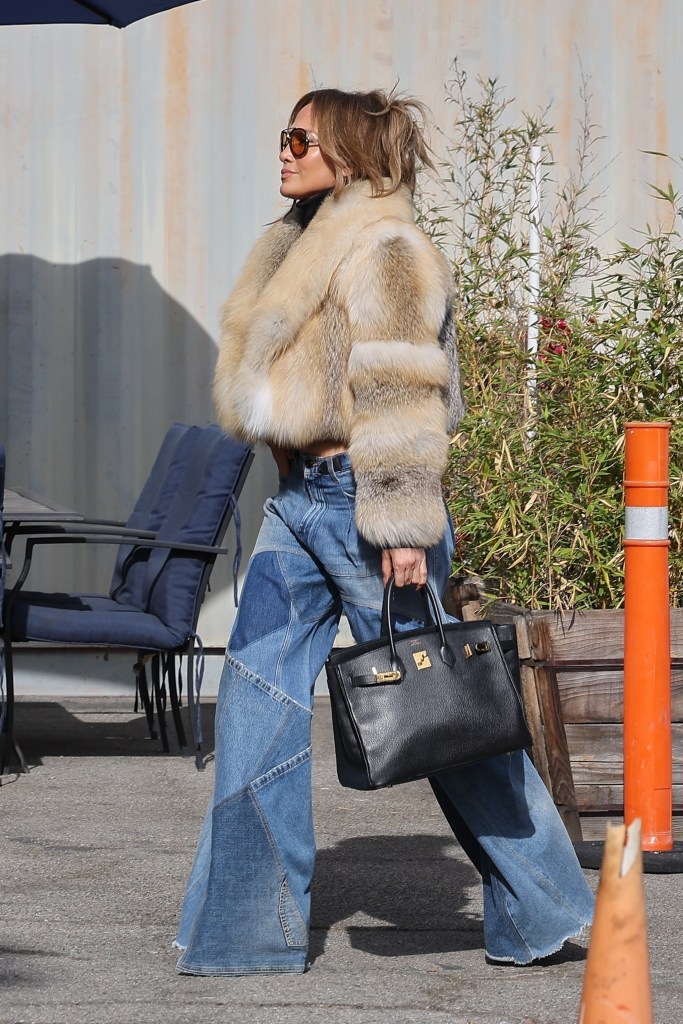 Jennifer Lopez in a fur coat.