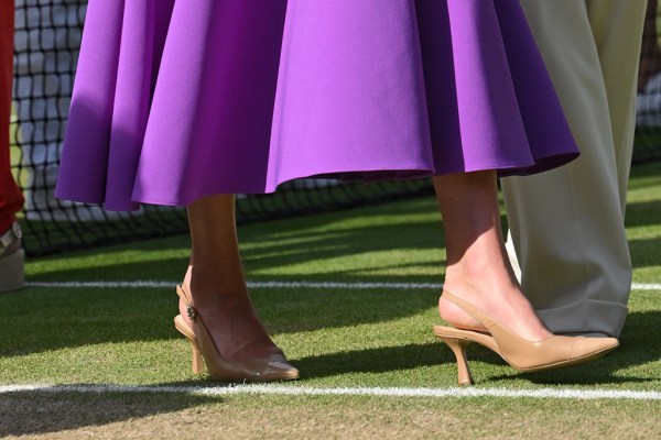 LONDON, ENGLAND - JULY 14: Catherine Princess of Wales on court to present the trophy to the winner of the men's final on day fourteen of the Wimbledon Tennis Championships at the All England Lawn Tennis and Croquet Club on July 14, 2024 in London, England. (Photo by Karwai Tang/WireImage)