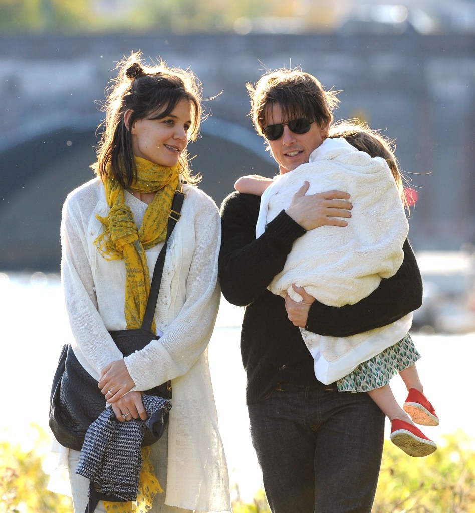 Katie Holmes, Suri Cruise and Tom Cruise visit Charles River Basin on Oct. 10, 2009 in Cambridge, Massachusetts.