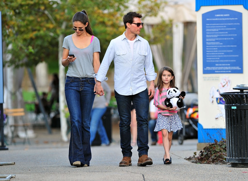 Katie Holmes, Tom Cruise and Suri Cruise visit Schenley Plaza's carousel on October 8, 2011 in Pittsburgh, Pennsylvania.