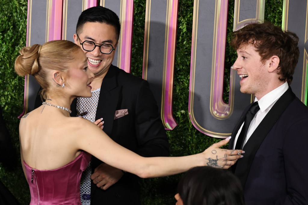 Ariana Grande and Ethan Slater on a red carpet on Nov. 14.