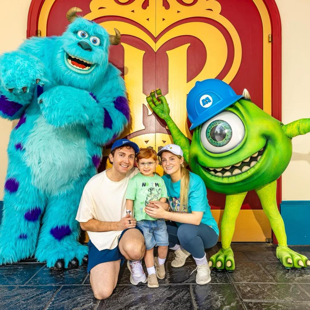 Meghan Trainor and husband Daryl with their kids at Disneyland.