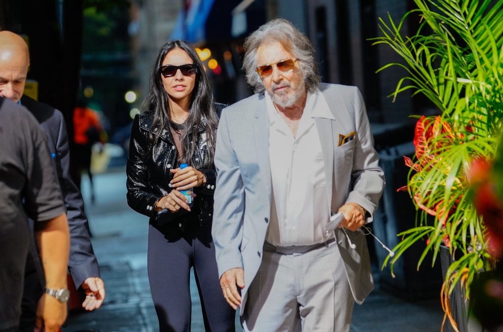 Noor Alfallah and Al Pacino arrive for a music video shoot with Bad Bunny on August 24, 2023 in New York City.