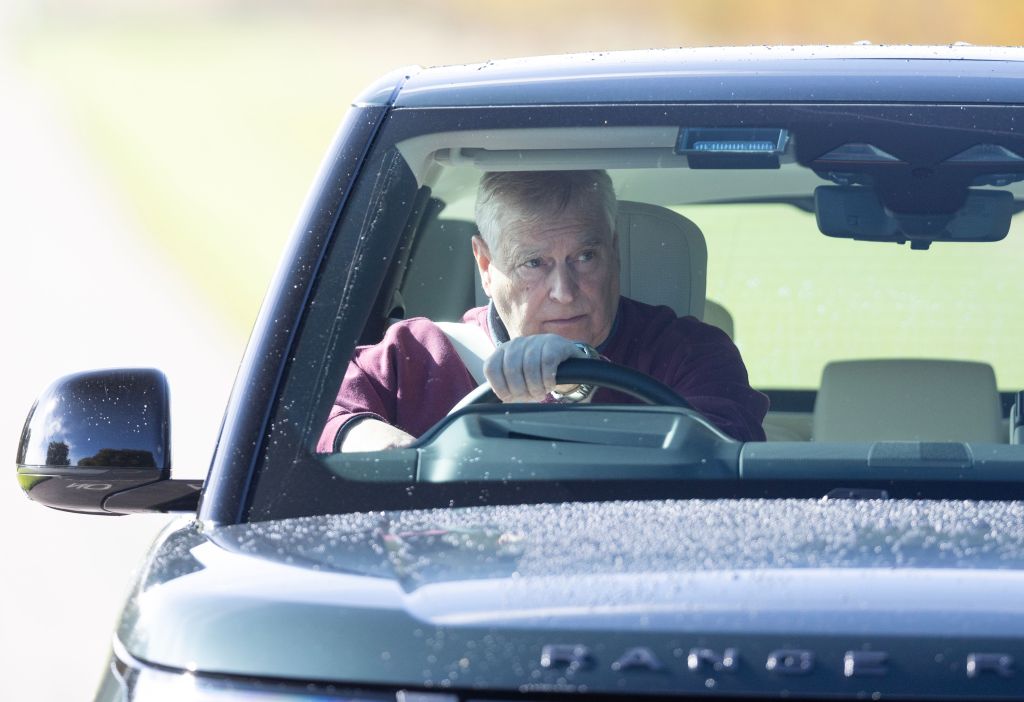 Prince Andrew driving.