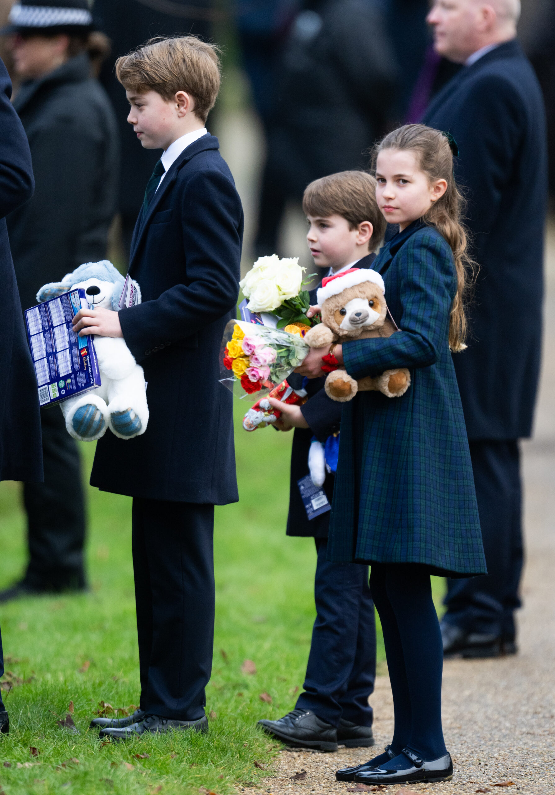 Prince George, Princess Charlotte and Prince Louis at the Church of St. Mary Magdalene in Norfolk, England on Wednesday, Dec. 25.