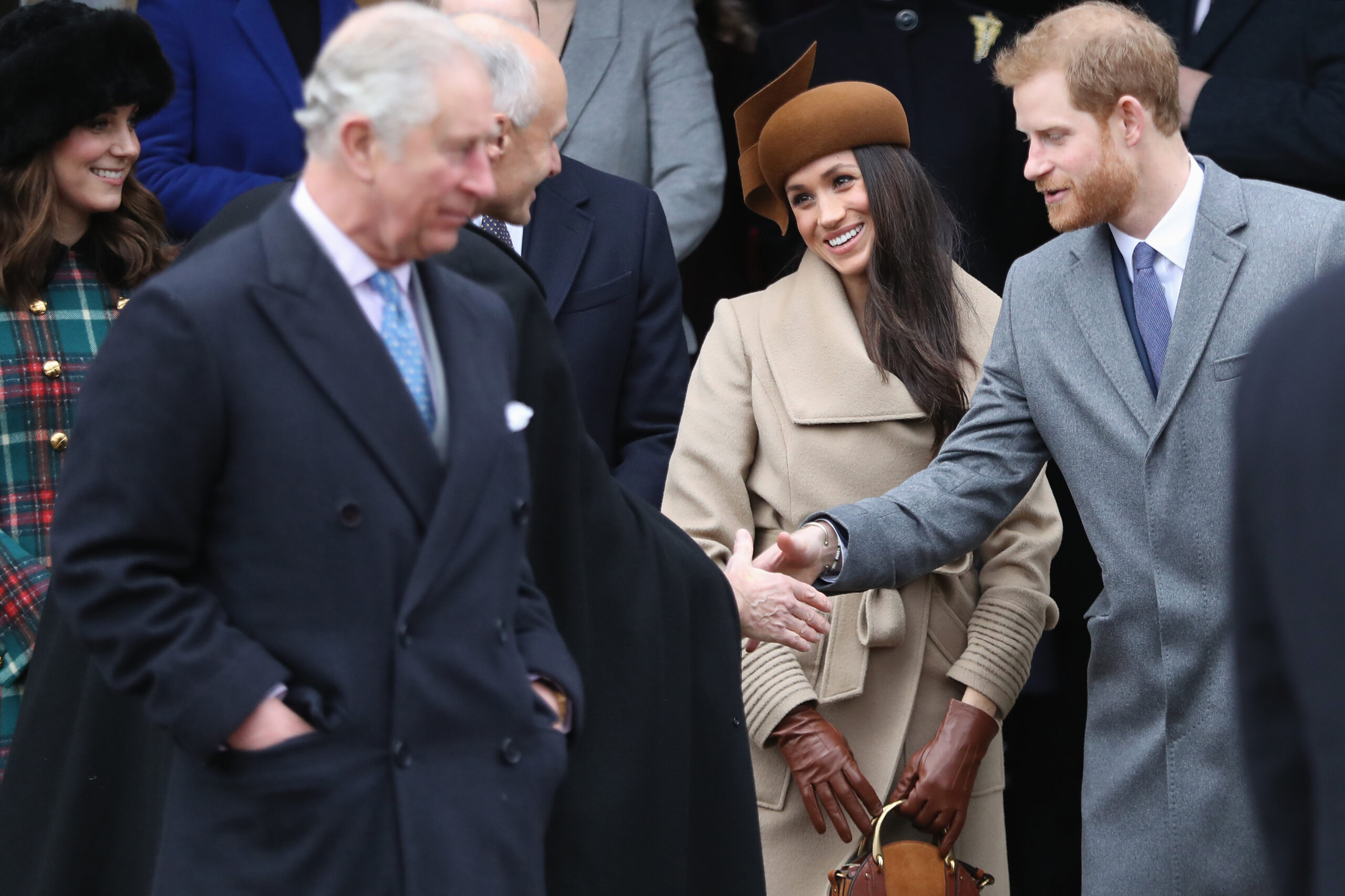 King Charles, Meghan Markle and Prince Harry.