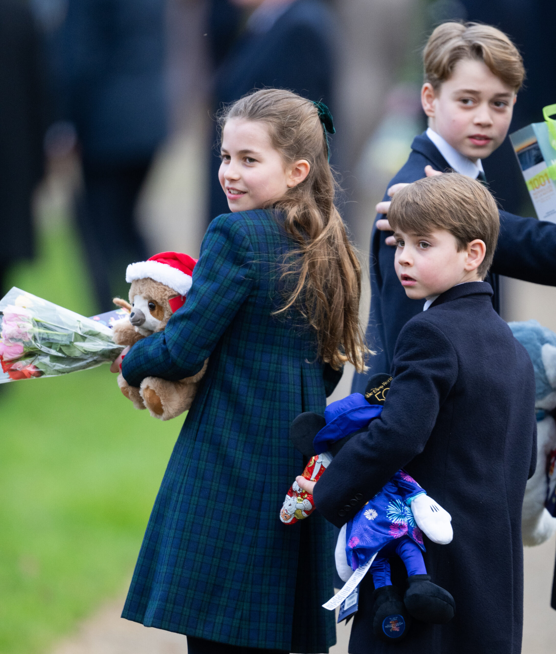 Prince George, Princess Charlotte and Prince Louis at the Church of St. Mary Magdalene in Norfolk, England on Wednesday, Dec. 25.