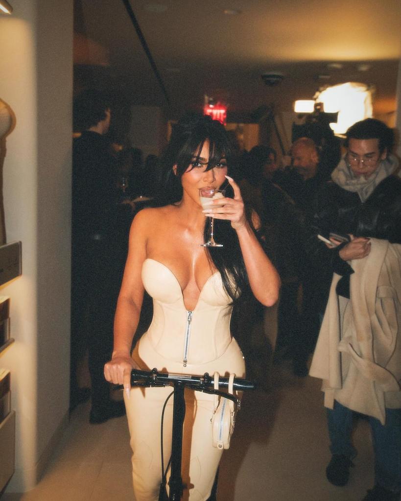 Kim Kardashian on a scooter