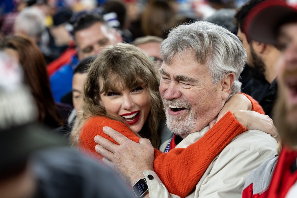 Travis Kelce's dad with Taylor Swift