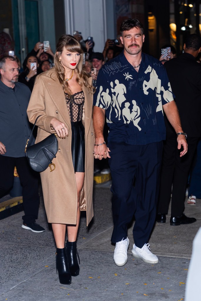 Taylor Swift and Travis Kelce walking in NYC