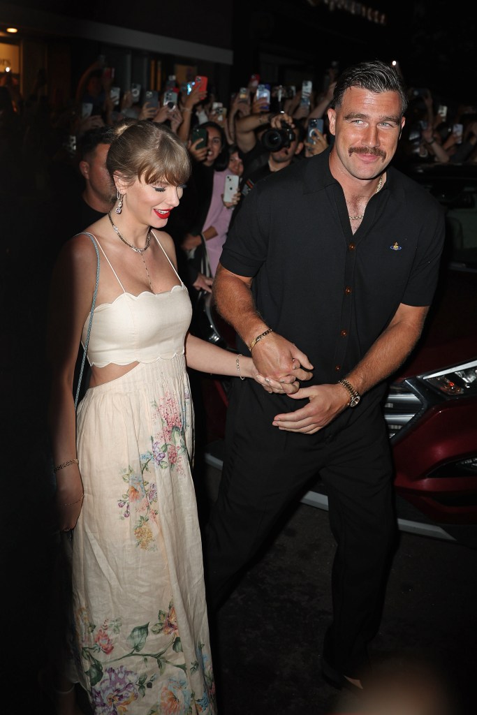 Taylor Swift and Travis Kelce walking in NYC