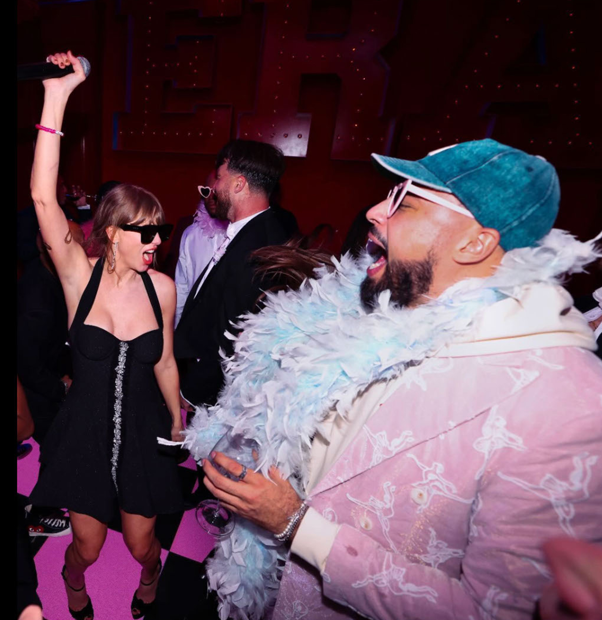 Taylor Swift, Travis Kelce and Ross Travis at the Eras Tour wrap party.