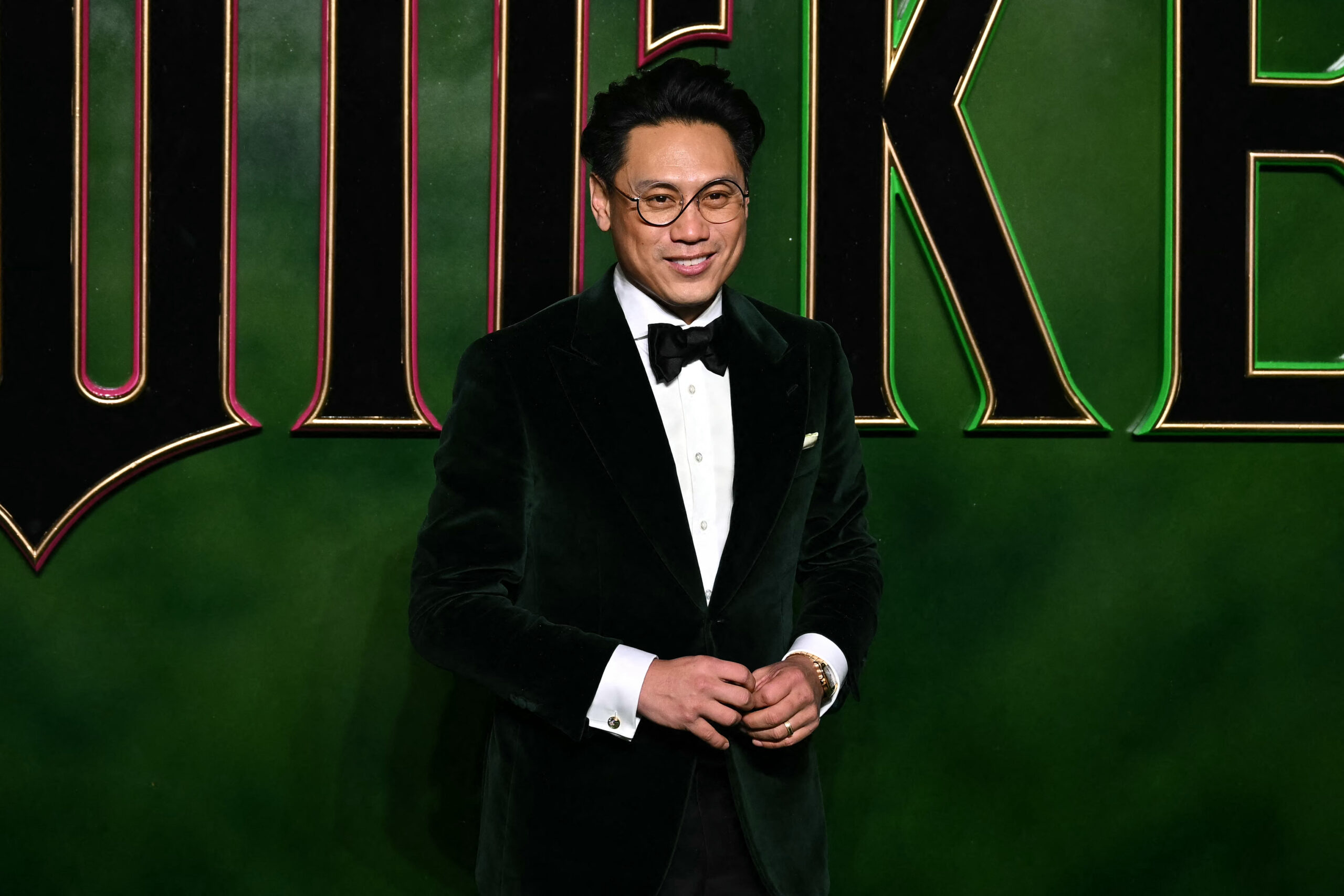 Jon M. Chu posing for a photo