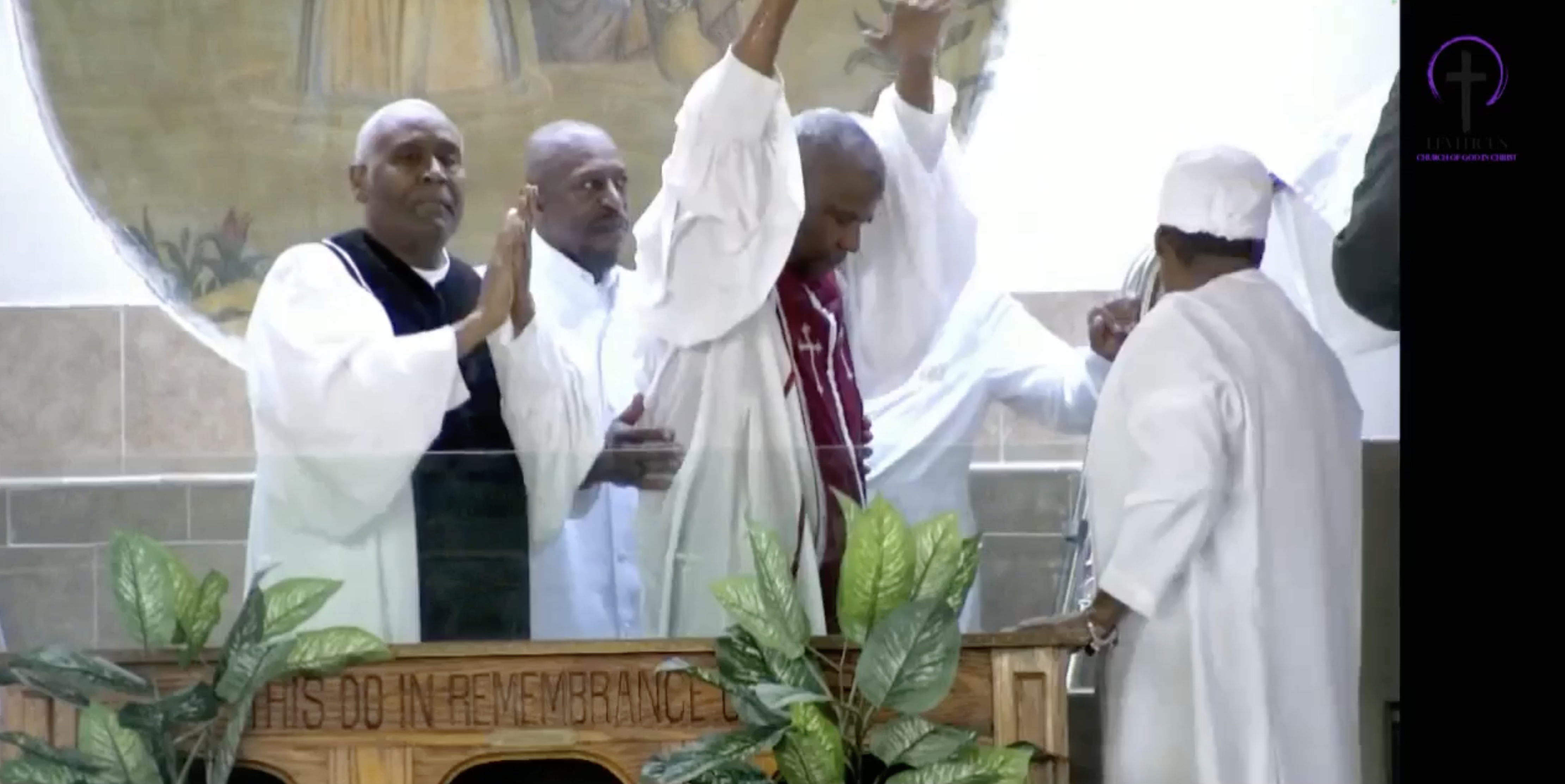 Denzel Washington getting baptized.