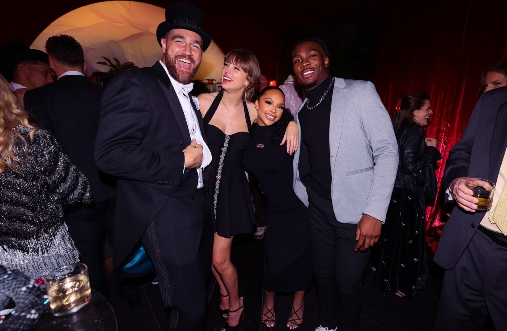 Taylor Swift and Travis Kelce with friends