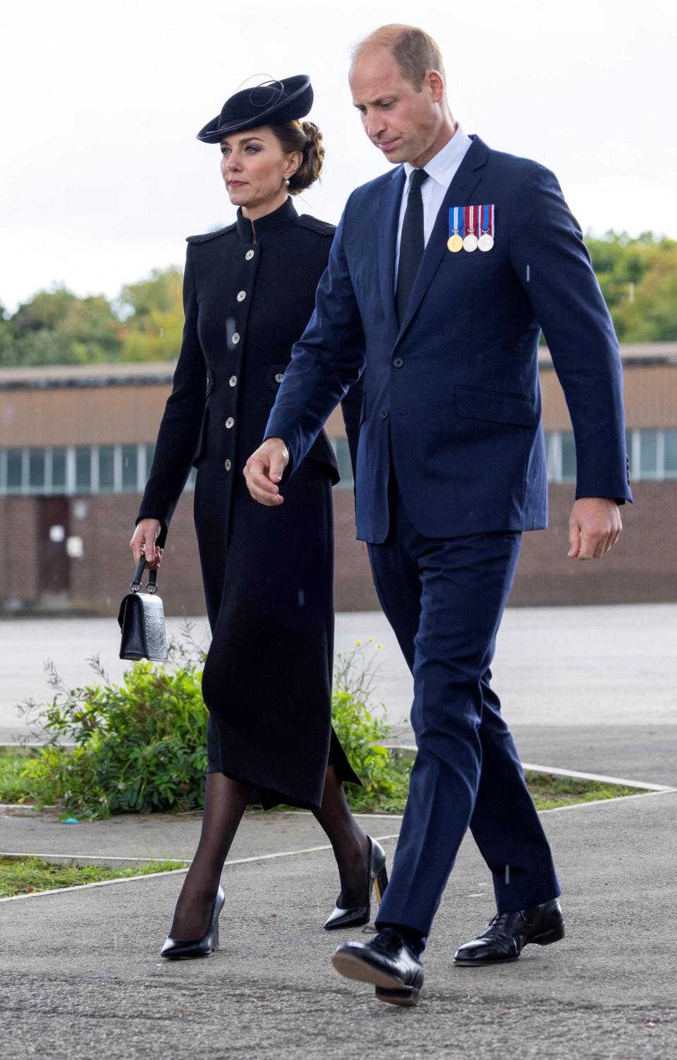 Kate Middleton and Prince William meet troops that participated in Queen Elizabeth II's state funeral in September 2022.