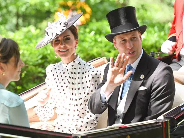 The Duke and Duchess of Cambridge smile to the crowds as they arrive at Royal Ascot