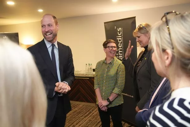 Prince William beams as he meets delegates at the inaugural Emergency and Critical Care Conference