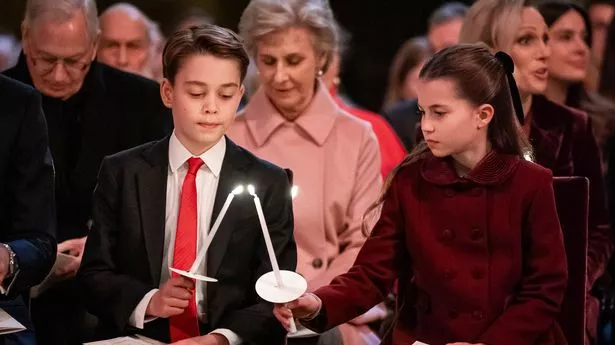 LONDON, ENGLAND - DECEMBER 06: Prince George and Princess Charlotte during the Together At Christmas carol service at Westminster Abbey on December 6, 2024 in London, England. The Prince and Princess of Wales, along with other members of the Royal Family, attended the annual carol service. Led by The Princess and supported by The Royal Foundation, the event offered a chance to pause and reflect on the profound values of love, compassion, and the vital connections we share—particularly during life's most challenging moments. The service also highlighted remarkable individuals from across the UK who have demonstrated extraordinary kindness, empathy, and support within their communities. (Photo by Aaron Chown - WPA Pool/Getty Images)