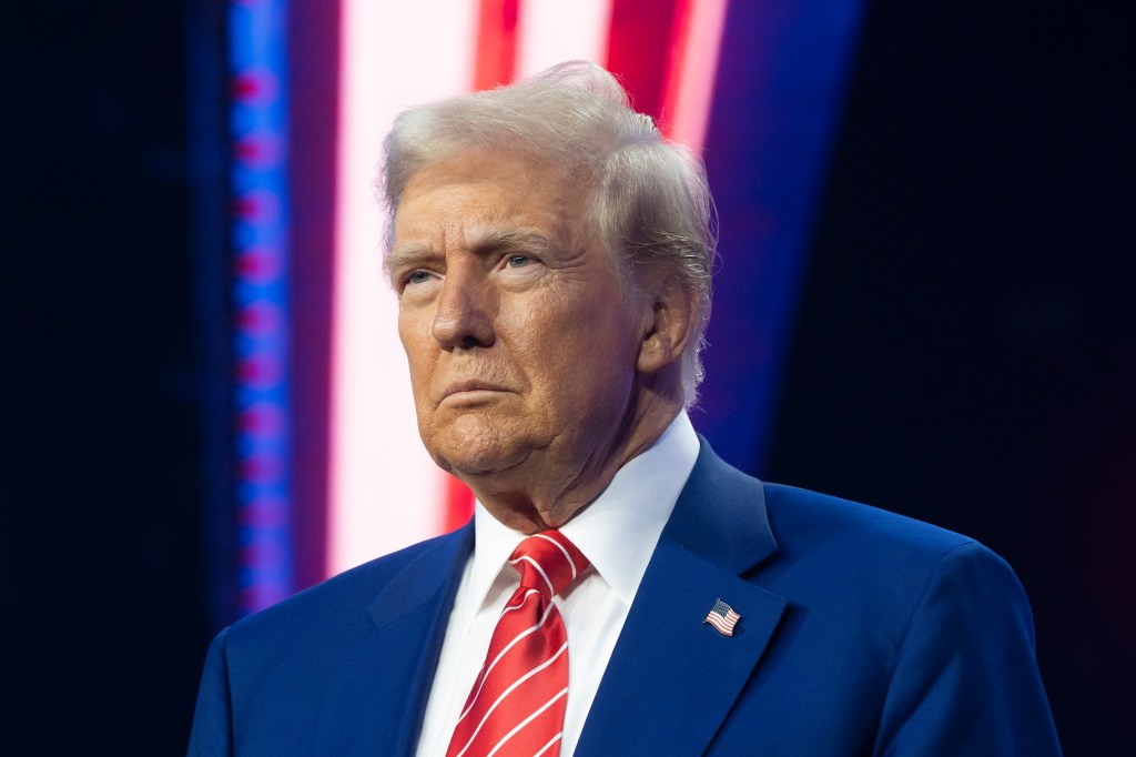 - DECEMBER 22: U.S. President-elect Donald Trump looks on during Turning Point USA's AmericaFest at the Phoenix Convention Center on December 22, 2024 in Phoenix, Arizona.