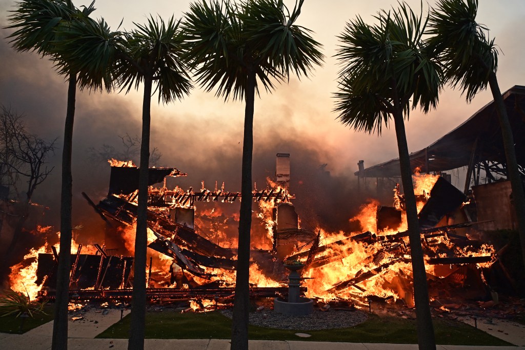 A home burns during the Palisades Fire in Pacific Palisades, Calif.