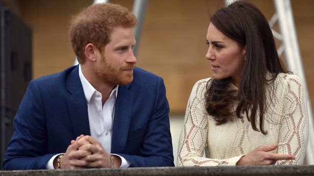 Kate Middleton and Prince Harry looking at each other and talking