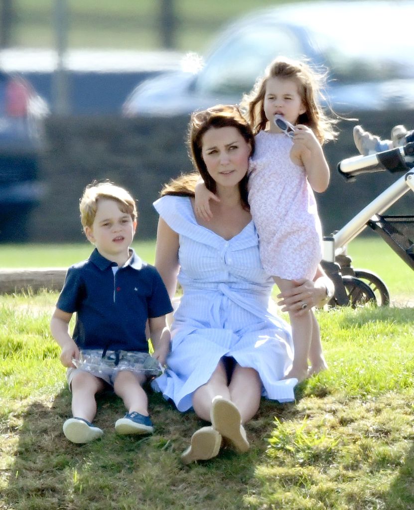 Prince George, Catherine, Kate Middleton and Princess Charlotte at the Maserati Royal Charity Polo Trophy at Beaufort Park on June 10, 2018 in Gloucester, England.