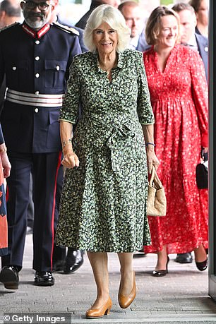 Cliff noted that the Fiona Clare dress, patterned with  leaves made her look dowdy